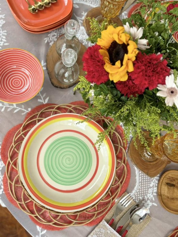 COLORED SWIRL PLATE W/ ORANGE RIM